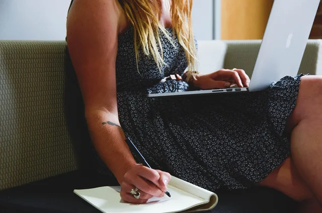 entrepreneur, startup, woman, macbook, laptop, planning, business, businesswoman, young, working, freelance, freelancer, notepad, notebook, sitting, couch, write, writing, work from home, entrepreneur, laptop, planning, writing, writing, writing, writing, writing. Proposal software for UK freelancers: what to look for